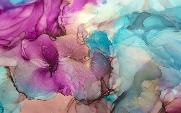 Currents of translucent hues, snaking gold swirls, and foamy sprays of color shape the marble of these free-flowing textures. The marbling techniques, alcohol ink, modern abstract painting 