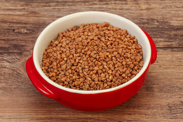 Raw buсkwheat cereal in the bowl