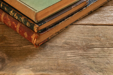 old books on a wooden table