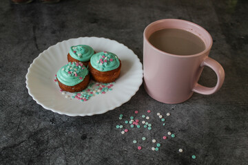 cupcakes in green glaze. powdered sugar.
cocoa or coffee