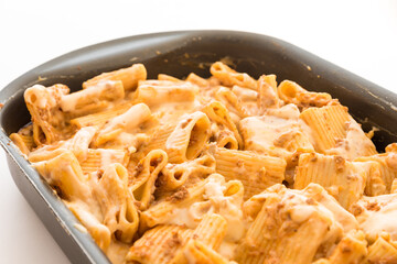 Macaroni with meat baked with cheese