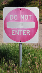 DO NOT ENTER - faded traffic sign