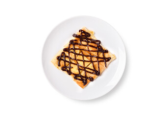 Flat lay of Fried Thai pancake roti with chocolate topping on white plate isolated on white background. clipping path.