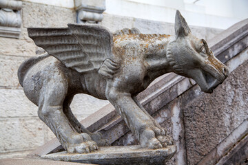 Old sculpture of a dog with wings, griffon