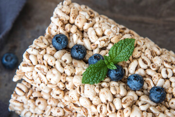 Grain rice cakes with blueberries for healthy breakfast. Healthy snack
