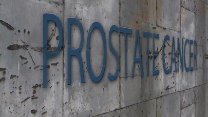 Close up Shooting concrete wall with word prostate cancer