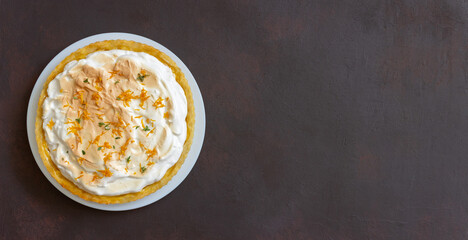 Lemon pie with meringue. Tart. Bakery products. Dessert.