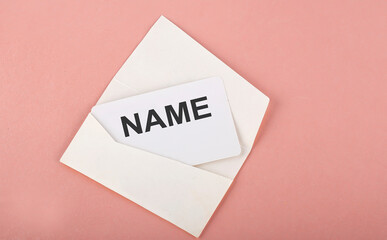 Word Writing Text NAME on card on pink background