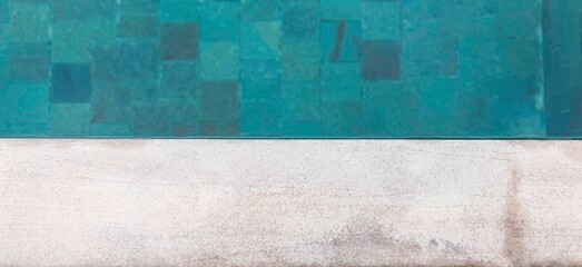 Panorama of Granite and drainage grates at the edge of the pool