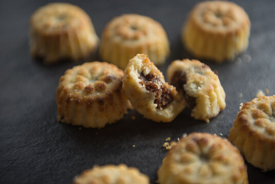 Close up of Date Maamoul pastries. Ma'amoul is a filled semolina cookies found in Arab regions made with dates and nuts.