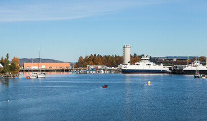 Fototapeta premium Boats and ferries moored at small Norwegian town