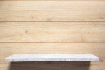 Wooden shelf at wooden wall background texture.  Book shelf on wall