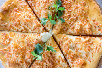 traditional food, khachapuri mingrelian with sulguni cheese. Georgian traditional flatbread -...