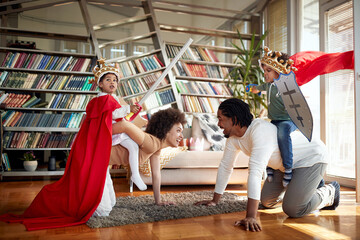 Fototapeta na wymiar Happy afro american family playing