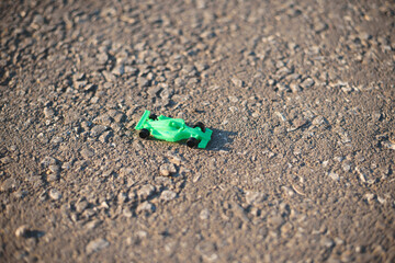 toy sport car on asphalt