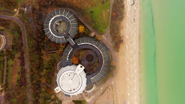 Top-down view on the round towers and spherical domes  of the Afina Pallada building in Luzanivka district, Odessa, Ukraine. 2021, 29 March.
