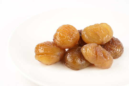Delicious Turkish candied chestnut  ( Kestane Sekeri ) or marron glace. Isolated on white background.