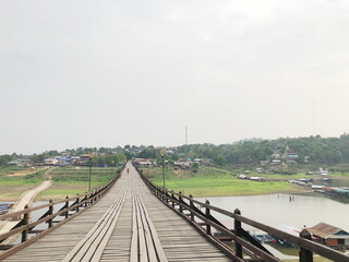 Wooden bridge over the river (Mon Bridge) in Sangkhlaburi District, Kanchanaburi, Thailand