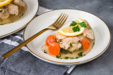 Fish in aspic with vegetables. Fish in jelly. Fish with gelatin.