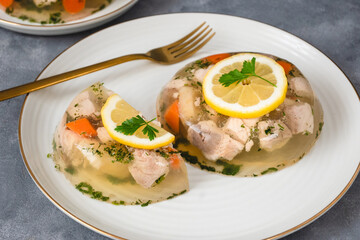 Fish in aspic with vegetables. Fish in jelly. Fish with gelatin.