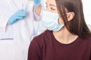 Naklejka premium complications and negative consequences of vaccination, a teenage girl is afraid of an injection of a vaccine due to allergies