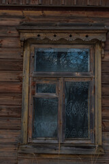 The window of an old wooden house.