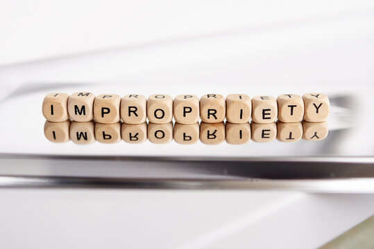 Word impropriety by wooden cubes