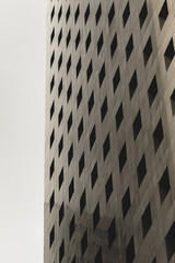 Part of urban street covered with gray concrete cubes