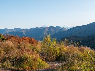 Morning at the Vilyuchinsky pass. Beautiful autumn view of mountain ranges and volcanoes. Kamchatka Peninsula, Russia.