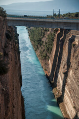 Obraz premium Long narrow Corinth Canal connecting the Corinth Gulf with the Saronic Gulf in Greece
