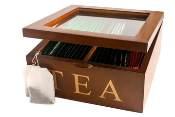 Wooden box for storing tea bags on an isolated white background. 