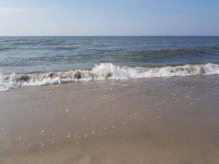 Sandy coast of the blue sea