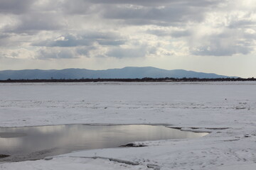 View of the Russian Amur River from the Khabarovsk embankment in winter