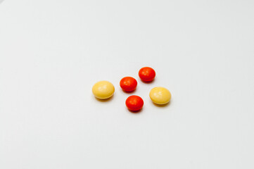 tablets and capsules on white background