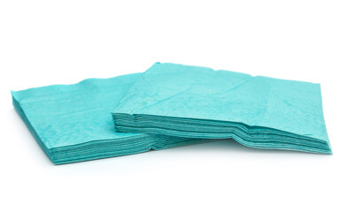 Two stacks of blue paper napkins on white.