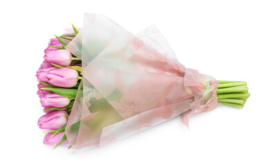 Bouquet of pink tulips wrapped in paper on white background.