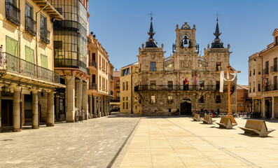 Cityscape of Astorga, Spain, with view of historic town hall building and main square.