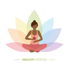 healthy yoga girl with apple on colorful lotus flower background