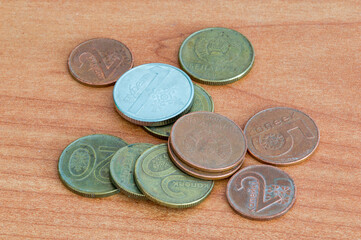 Coins of the Belarusian ruble ​on wooden table.