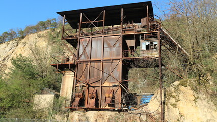 Crusher and screen in an old quarry in the city of Dossenheim in Germany. Child labor was very common in the early days of operation of the quarry.
