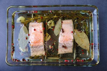 Trout (salmon) in oil with herbs and spices, cooked by the confit method. Traditional French dish....