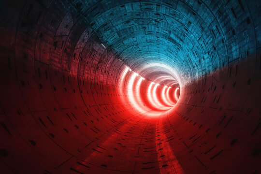 Red-blue illumination of the subway tunnel.