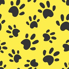 Dog or cat paws traces illustration. Grey stamps on yellow background. Seamless pattern. For logo, wallpaper, fabric, packing, wrapper, scrapbooking, digital paper.