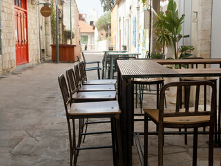 Counter and high bar stools at street cafe 
