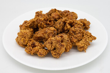 Boneless Korean Fried Chicken Wings on a White Plate