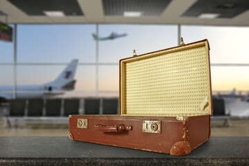 Brown old suitcase on airport and free space for your decoration 