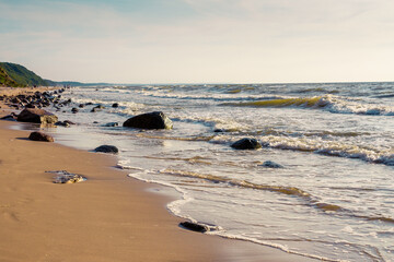 Fototapeta na wymiar Poddąbie Bałtyk - a picturesque Polish beach - kamienie na plaży