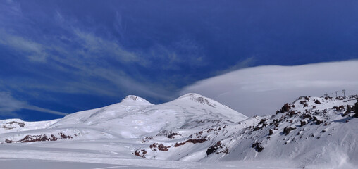 Fototapeta na wymiar Snowy mountains of the Caucasus. Ski resort.