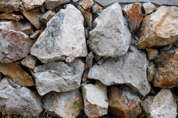 Arranged stone surface, rough wall texture background