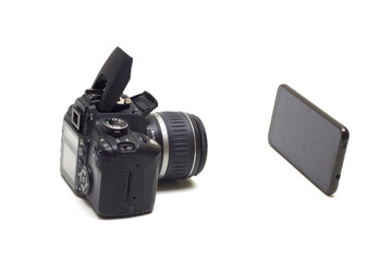 old camera and smartphone
